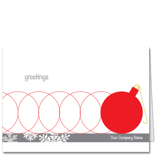 Business Christmas Cards Rolling Through the Holidays 3502 Red circles of kinetic energy and a festive red Christmas tree ornament.