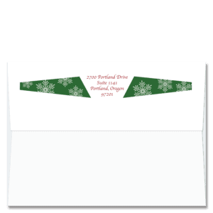 Custom design self-sealing FlapArt envelope with snowflakes on green decorative elements and printed with your return address.