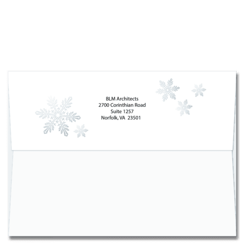 Snowflakes surround your return address on the back of these self sealing FlapArt greeting card envelopes.