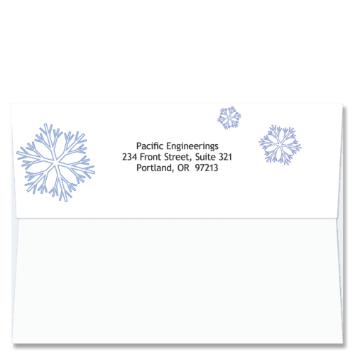 Custom design self-sealing FlapArt envelope with three blue abstract snowflake crystals and printed with your return address.