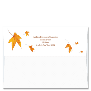 Custom design self-sealing FlapArt envelopes with falling Autumn leaves in shades of red and gold to accent your printed return address.