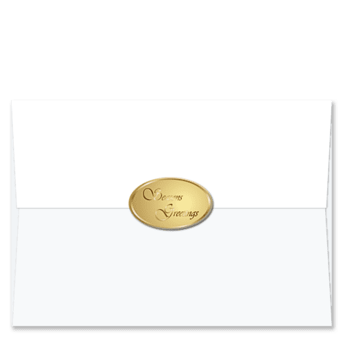Oval shaped gold foil Christmas card envelope seals embossed with Season’s Greetings in cursive font.
