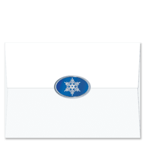 Oval shaped foil envelope seal with a single silver snowflake on a blue background and silver border.