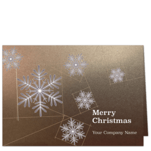 Scattered geometric white snowflakes on bronze metallic card stock make an elegant business Christmas cards with your company name on the front in white ink