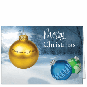 Christmas cards for business with 3 colorful ornament in front of a snowy winter scene. Your company name can be added to the gold ornament, and the blue has a decoration of paper dolls holding hands, the green ornament displays our little earth.